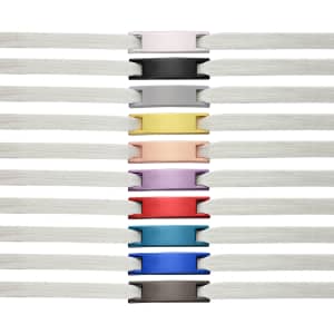 Classic shoelace charms displayed in various colours, featuring multiple charm designs and white shoelaces in the background.
