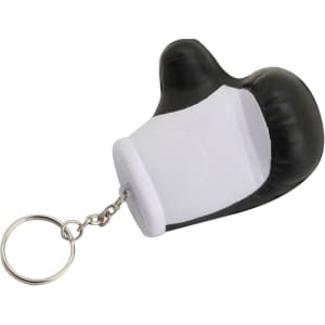 A black and white stress glove key ring attached to a metal chain. It features a glove design.