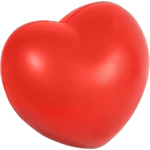 A small, red heart-shaped stress relief toy made of soft material, featuring a smooth finish.