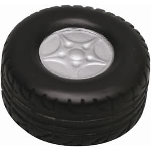 A black stress relief toy shaped like a tyre, featuring a silver rim in the centre. It has a textured surface.