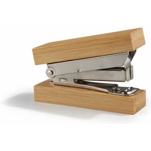 A bamboo stapler with a silver metal mechanism, featuring a natural wood finish.