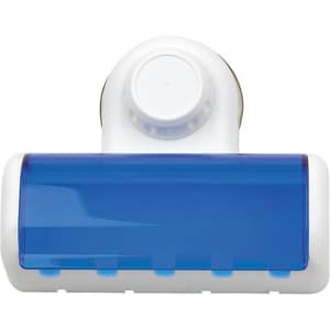 A toothbrush holder in white and blue, featuring a suction mechanism for easy attachment.