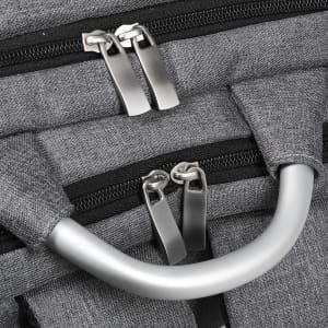 A grey laptop backpack with dual zippers and a silver handle. It has a textured fabric and features branding.