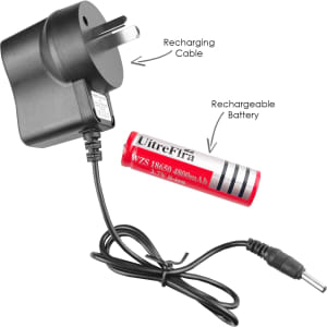 A charging adapter with a recharging cable and a red rechargeable battery, labelled with brand details.