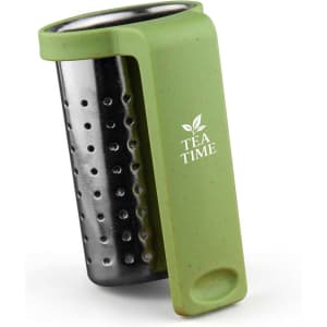 A green travel tea infuser made of stainless steel with a silicone handle and a logo on the side.