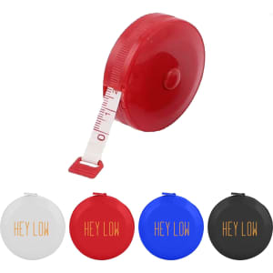 A compact red tape measure with a retractable white tape, alongside three additional coloured options: white, blue, and black.