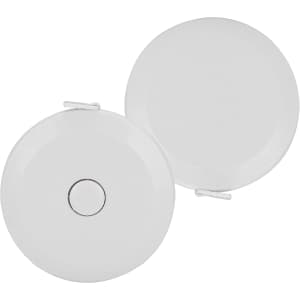 A compact tape measure in white, featuring a circular design with a metal button and a clip for attachment.