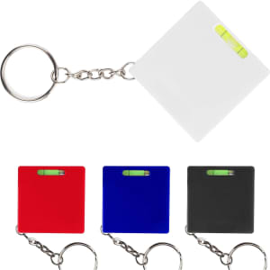 A set of four leveller tape measures in white, red, blue, and black, each attached to a keyring.