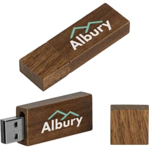 A wooden USB flash drive in brown with a logo on the surface. It features a sliding cap for the USB connector.