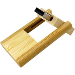 A bamboo USB flash drive with a wooden casing, featuring a sleek design and a metallic connector.