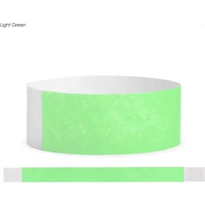 A light green Tyvek adult wristband with a decorative white end. Features a logo or branding.