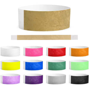 A collection of Tyvek adult wristbands in various colours, including white, pink, red, green, and more, with a textured finish.