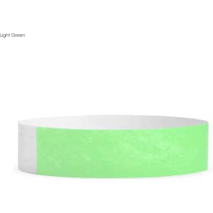 A light green Tyvek wristband with a smooth texture, featuring a logo. Suitable for events and exhibitions.