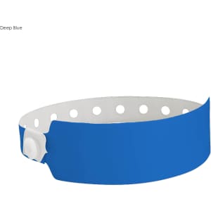 A deep blue vinyl wristband with white holes and a secure fastening, suitable for events and exhibitions.