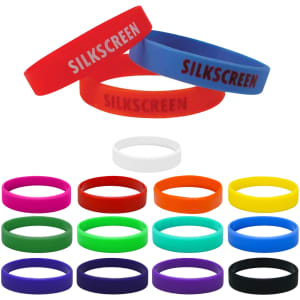 A selection of silicone wristbands in red, blue, white, orange, yellow, green, purple, and black, featuring various designs.