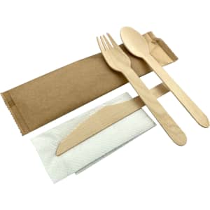 A wooden cutlery set featuring a fork, spoon, knife, and napkin, all presented in environmentally friendly packaging.