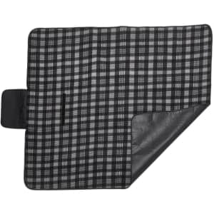 A picnic rug with a black and white checkered pattern and a black waterproof backing, featuring a side pocket.