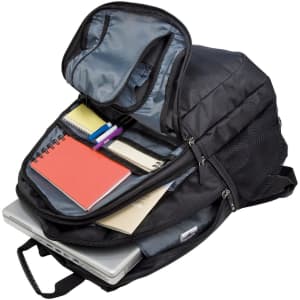 A black laptop backpack with multiple compartments filled with notebooks, pens, and a laptop. It features a logo.