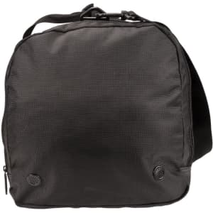 A black duffle bag with a textured surface, featuring a shoulder strap and a logo on the front.