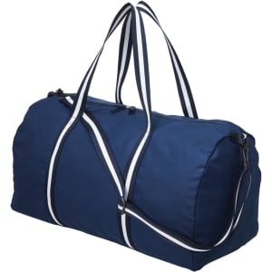 A navy canvas duffle bag with contrasting white handles and stripes, featuring a zip closure and a shoulder strap.