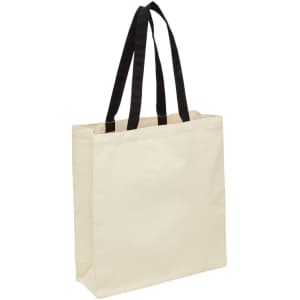 A cream canvas tote bag with black handles and a gusset for added space, featuring a logo.