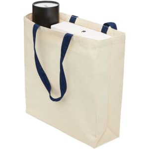 A cream canvas tote bag with navy handles, featuring a gusset, holding a drink bottle and a box inside.