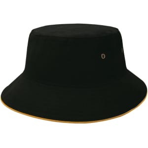 A black bucket hat with a contrasting gold trim and metal eyelets for ventilation. It features a logo.
