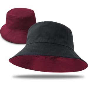 A reversible bucket hat featuring black on one side and burgundy on the other, with a logo.