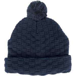 A navy blue pom pom beanie with a textured pattern and a fluffy pom pom on top. It has a folded brim.