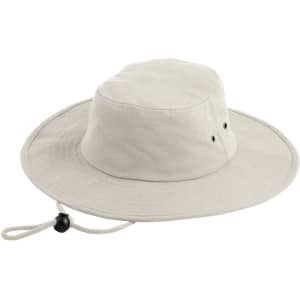 A beige surf hat with a wide brim and a chin strap, featuring ventilation holes and a simple logo.