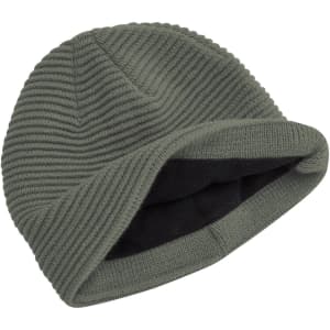 A green ribbed beanie with a folded cuff, featuring a soft inner lining and a logo.