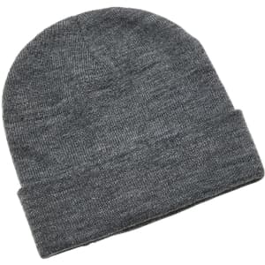 A grey beanie featuring a folded cuff, made from a soft knitted material. It has a logo on the side.