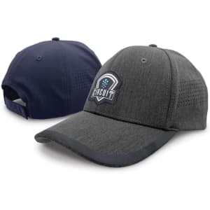 A grey cap with a curved brim and a logo on the front, featuring navy accents at the back and sides.