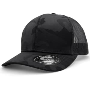A black camo trucker cap with mesh sides and a branded tag on the front.