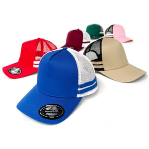 A collection of trucker caps in blue, red, pink, burgundy, and beige with mesh backs and a logo.