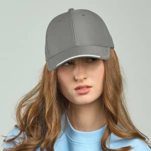 A grey cap made from recycled polyester, featuring a contrasting white brim and a logo on the front.