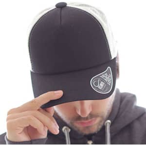 A black trucker cap with a white mesh rear, featuring a branded patch on the front.
