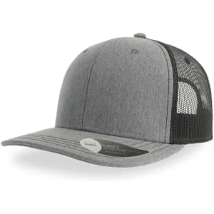 A grey trucker cap with a mesh back and a rounded brim, featuring a logo on the front.
