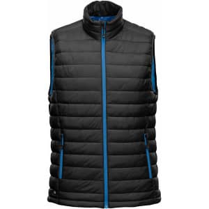 A black thermal vest with blue detailing, featuring a zip front and side pockets. It has a logo on it.