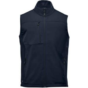 A dark navy softshell vest featuring a zippered front and side pockets, with a logo on the lower section.