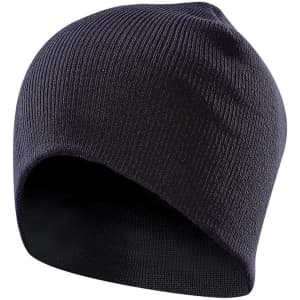 A dark navy beanie with a ribbed texture and an interior lining, featuring a logo on the side.