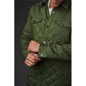 A green quilted jacket with a button-up front and chest pockets, featuring a logo on the upper left.