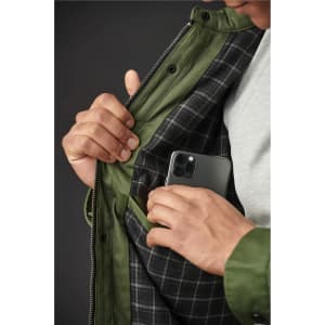 Men's Bushwick Quilted Jacket in olive green, featuring a plaid lining and an inside pocket for a phone.
