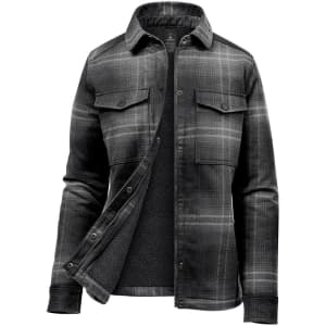 A Women's plaid jacket featuring a black and grey pattern with a sherpa lining, button-up front, and chest pockets.