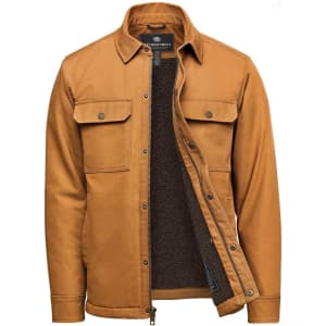 A men's jacket in a warm brown hue with a Sherpa lining and two front pockets, featuring a logo on the interior.