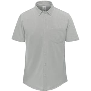 A light grey men's short sleeve knit shirt featuring a button-up collar and a front pocket. It has a logo on it.