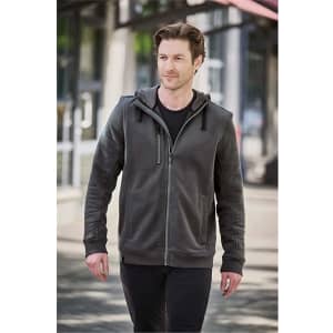 A man wearing a charcoal grey zip-up fleece hoody with a hood, walking in an urban setting.