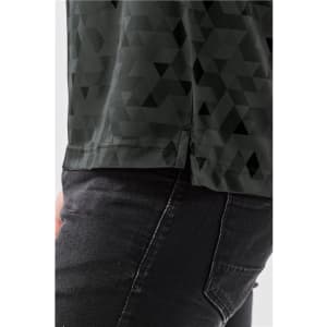 A side view of a dark green Men's Galapagos Polo featuring a geometric pattern, with a visible logo detail.