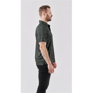 A men's polo shirt in a dark green colour featuring a subtle pattern, shown from the side. The shirt has a collar and short sleeves.