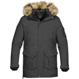A grey men's expedition parka featuring a fur-lined hood and multiple pockets. The jacket has a logo on it.